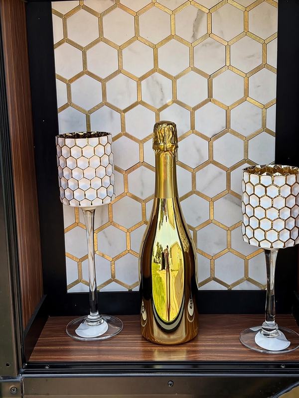 Hex-tile side cubby on the tap trailer, a spot for decor and photos