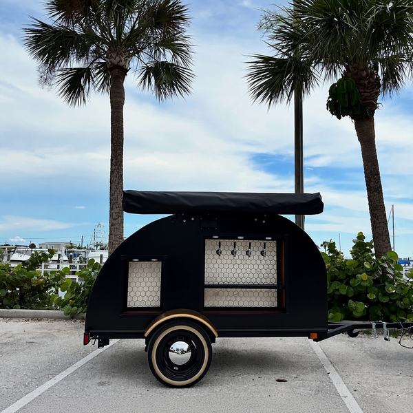 The Sunshine and Sips self-serve 4-tap trailer, ready to roll for your event